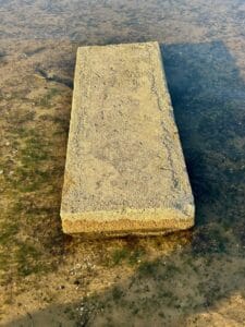 Close view of a concrete grave vault underwater on Dale Hollow Lake